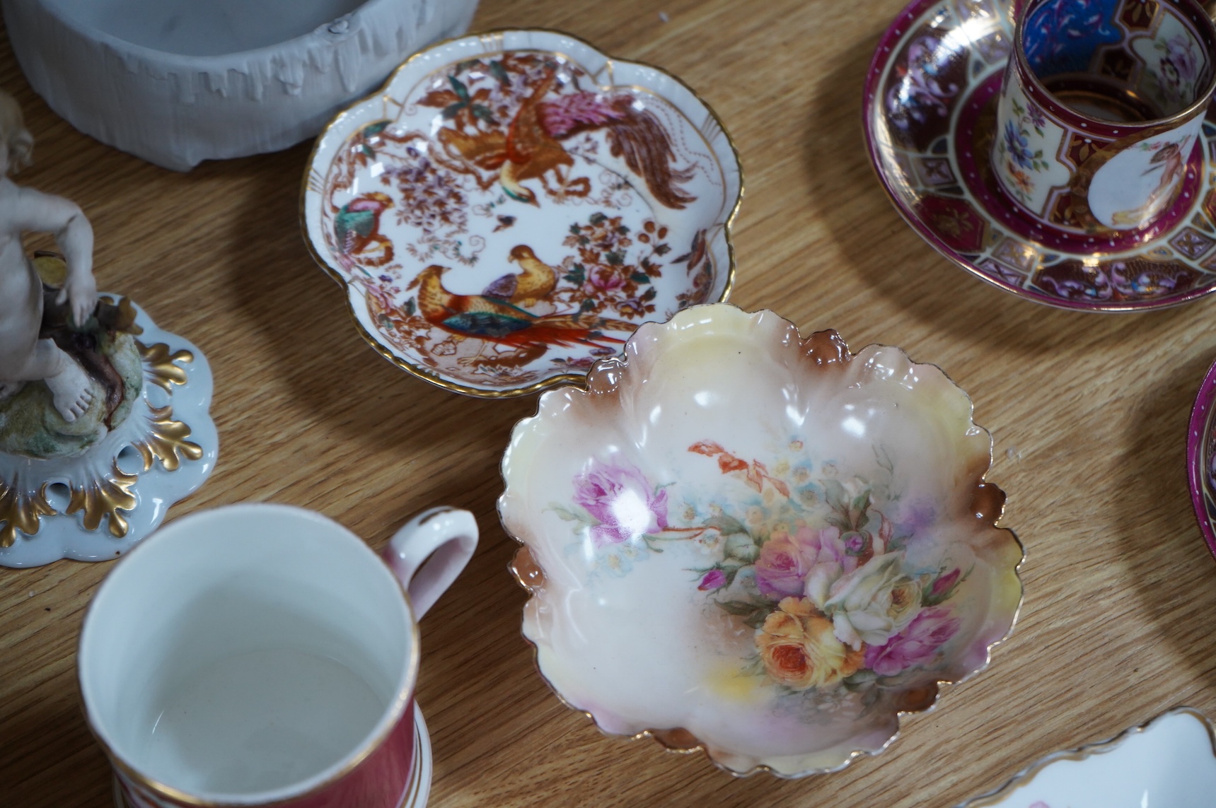 A bisque figure group of the Three Graces - 27cm high, a smaller smaller bisque figure, a pair of Vienna style coffee cans and saucers and a collection of mixed floral china. (22)